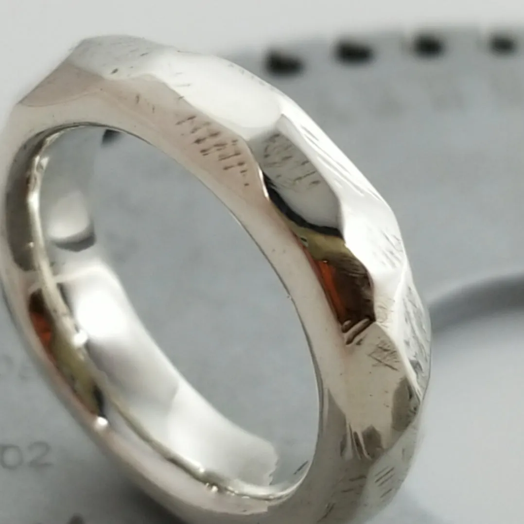 Discover Mr. Edgy: A One-of-a-Kind Solid Silver Ring with a Faceted Surface and Artistic Design