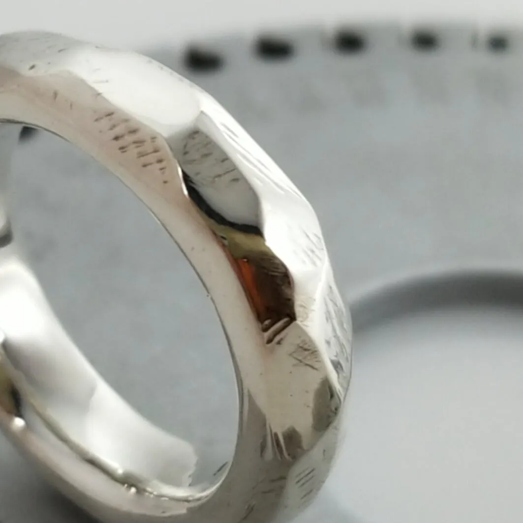 Discover Mr. Edgy: A One-of-a-Kind Solid Silver Ring with a Faceted Surface and Artistic Design