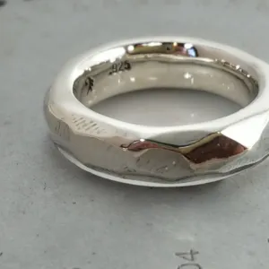 Discover Mr. Edgy: A One-of-a-Kind Solid Silver Ring with a Faceted Surface and Artistic Design