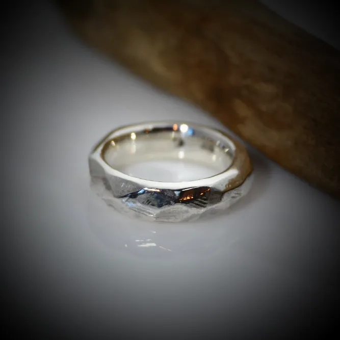 Discover Mr. Edgy: A One-of-a-Kind Solid Silver Ring with a Faceted Surface and Artistic Design
