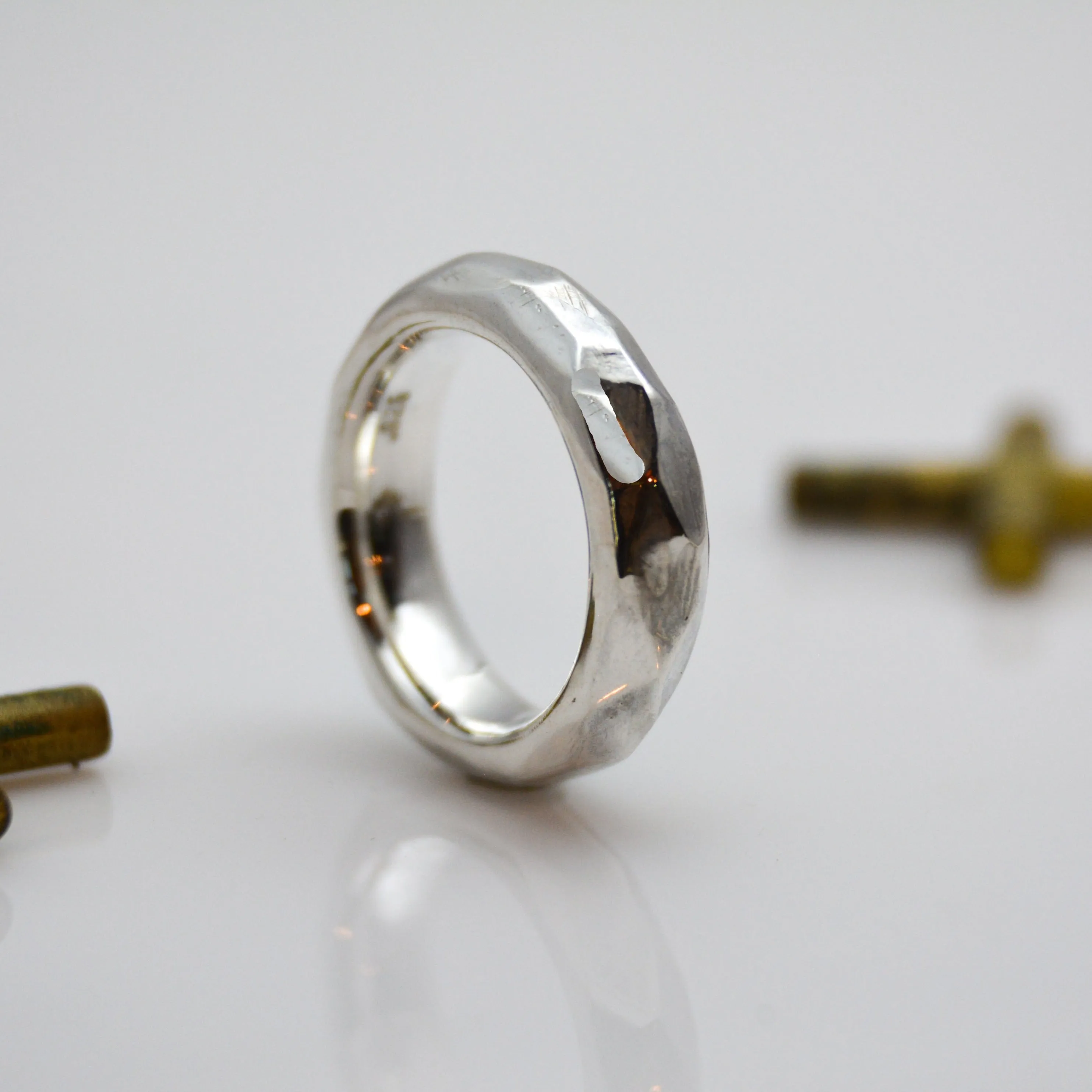 Discover Mr. Edgy: A One-of-a-Kind Solid Silver Ring with a Faceted Surface and Artistic Design
