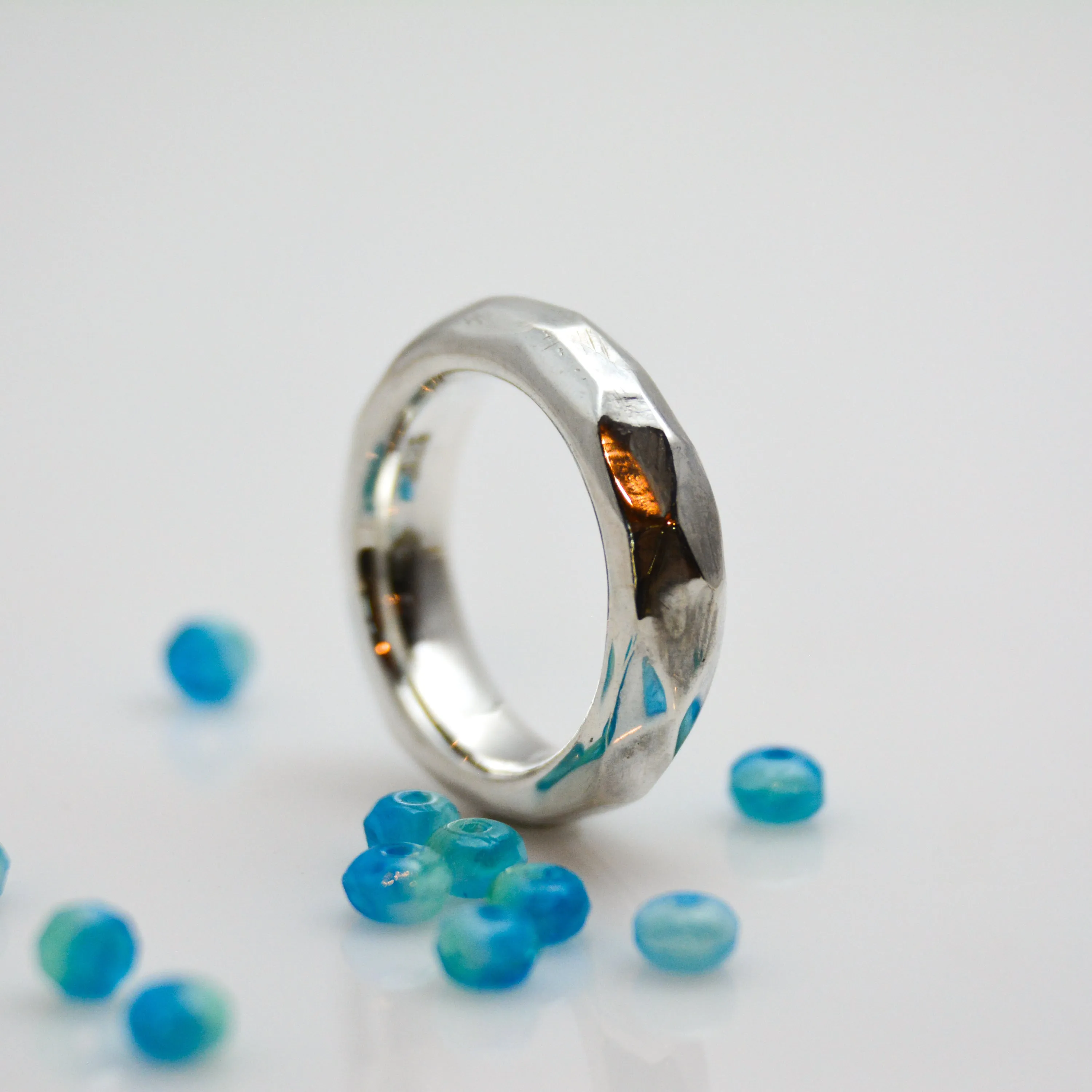 Discover Mr. Edgy: A One-of-a-Kind Solid Silver Ring with a Faceted Surface and Artistic Design