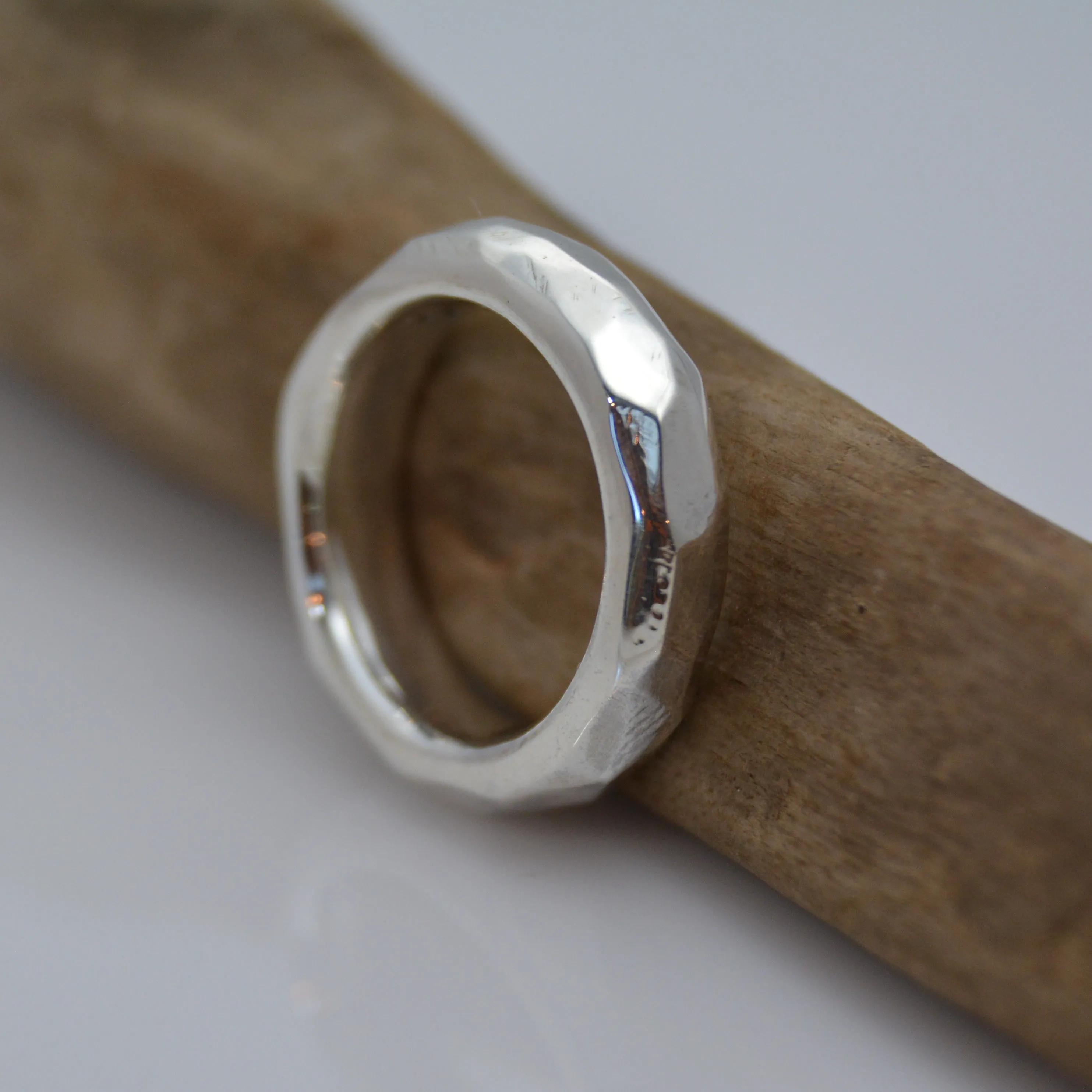 Discover Mr. Edgy: A One-of-a-Kind Solid Silver Ring with a Faceted Surface and Artistic Design
