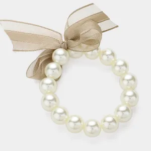 iLLASPARKZ Bow Pointed Pearl Stretch Bracelet