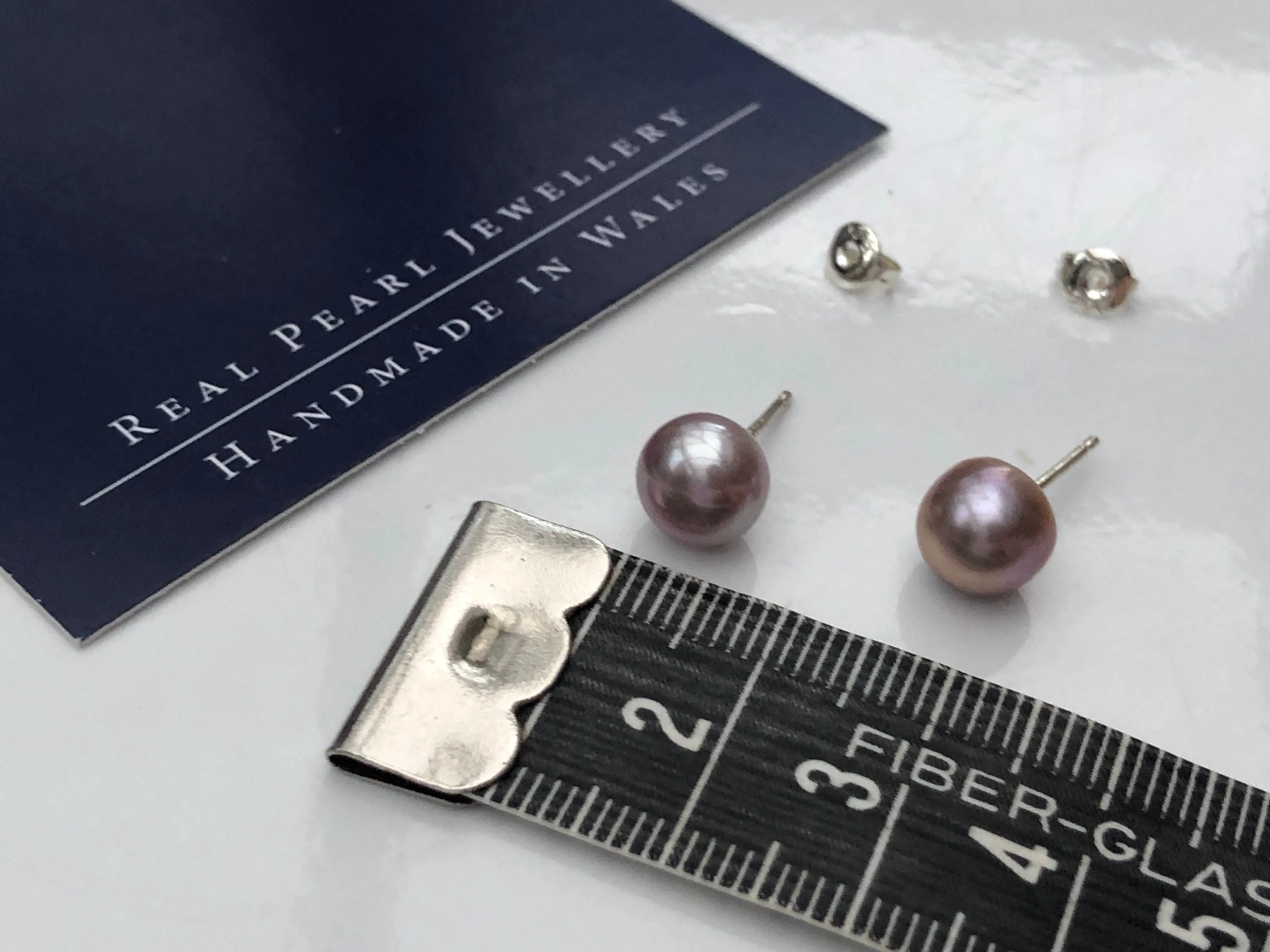 Stud Earrings: Dusky lilac large with a hint of mink