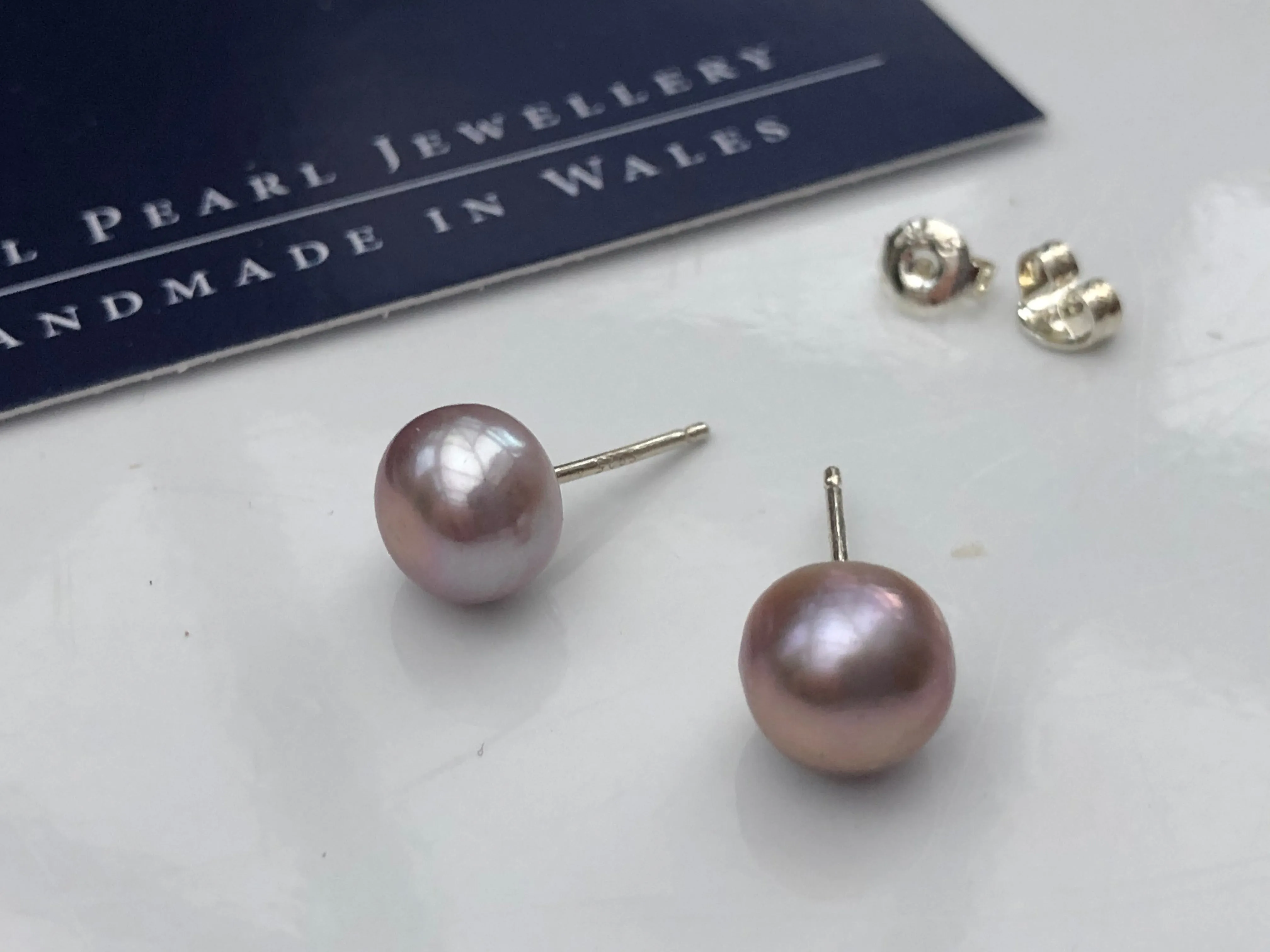 Stud Earrings: Dusky lilac large with a hint of mink